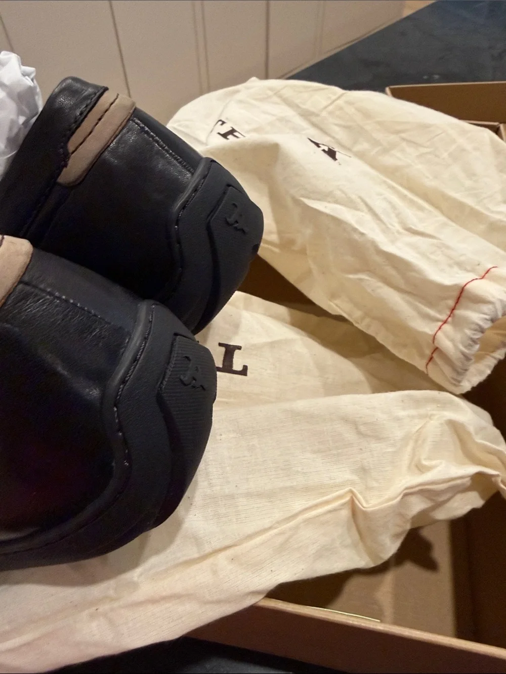 Trask brown and tan loafers box